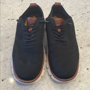 Black breathable, slip on casual men’s shoes